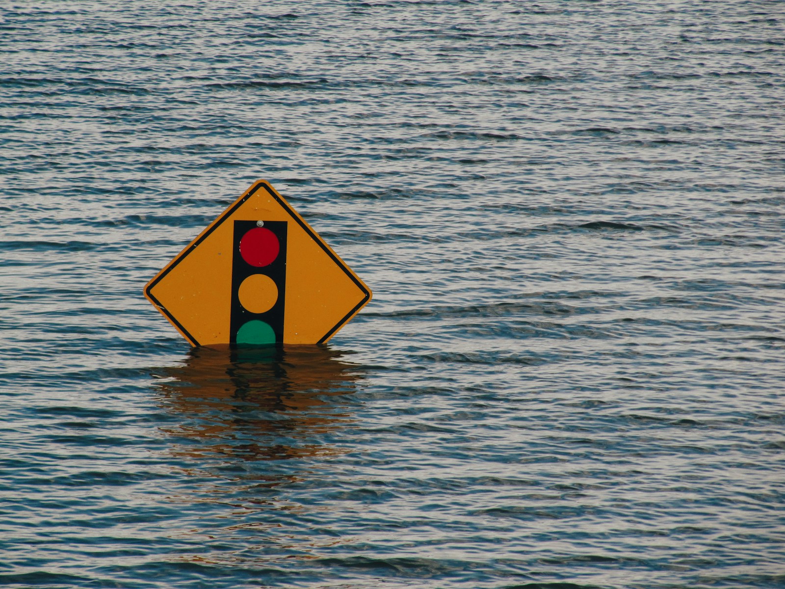 Photo by Kelly Sikkema traffic light sign underwater