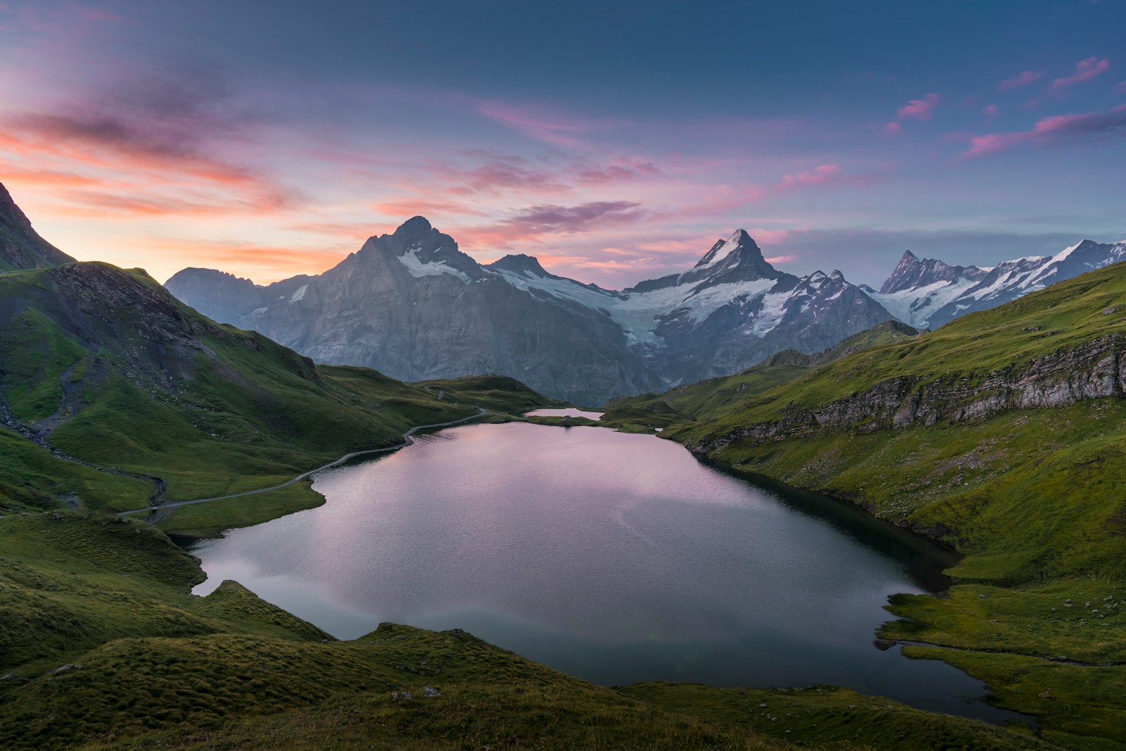 Photo by Ansgar Scheffold lake in the middle of green mountains